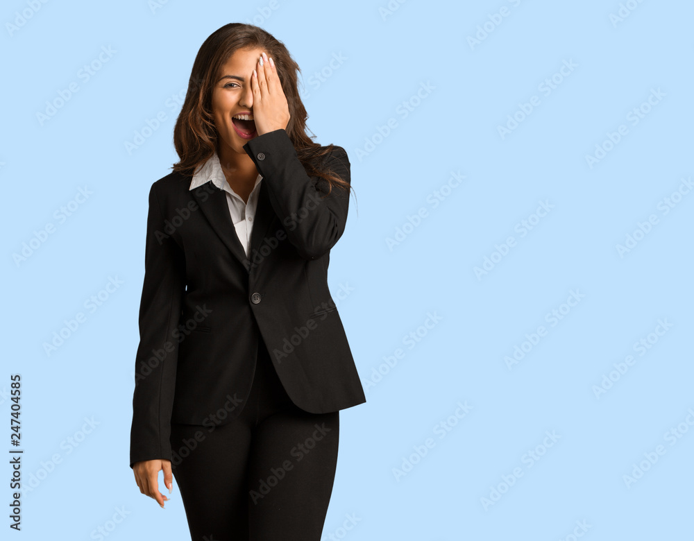 Full body young busines woman shouting happy and covering face with hand Full body young busines woman shouting happy and covering face with hand