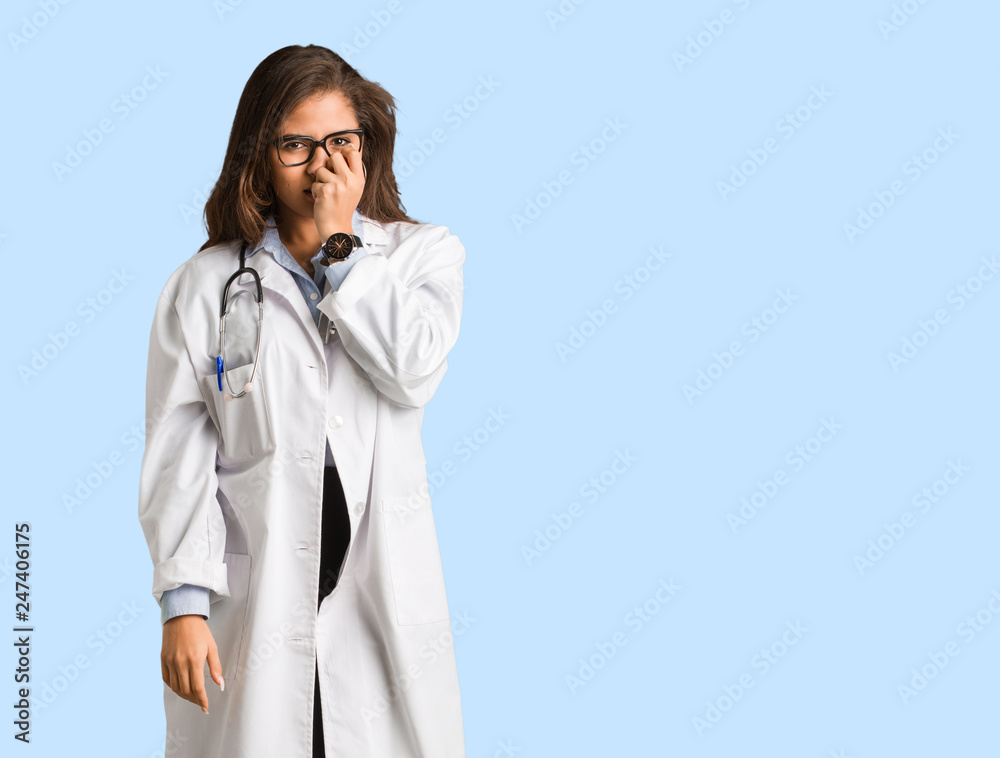 Full body young doctor woman biting nails, nervous and very anxious Full body young doctor woman biting nails, nervous and very anxious