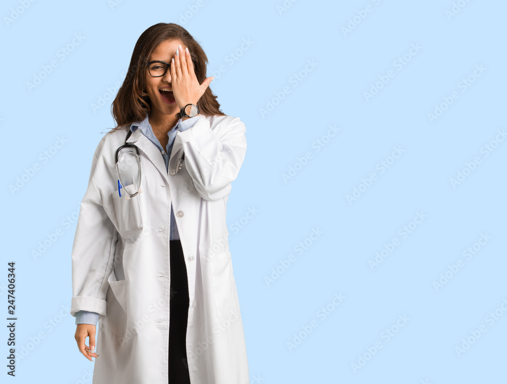 Full body young doctor woman shouting happy and covering face with hand Full body young doctor woman shouting happy and covering face with hand