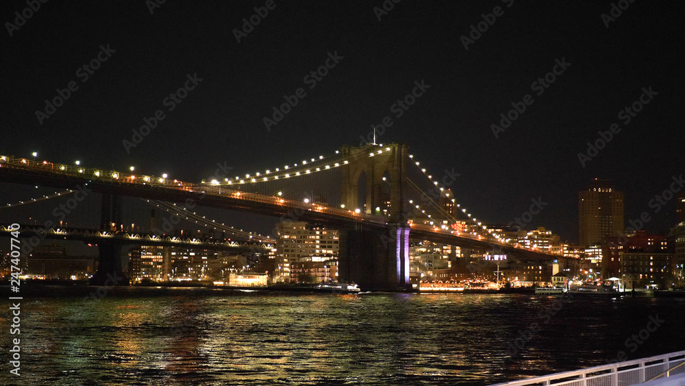 Wonderful place in New York at night the illuminated Brooklyn Bridge