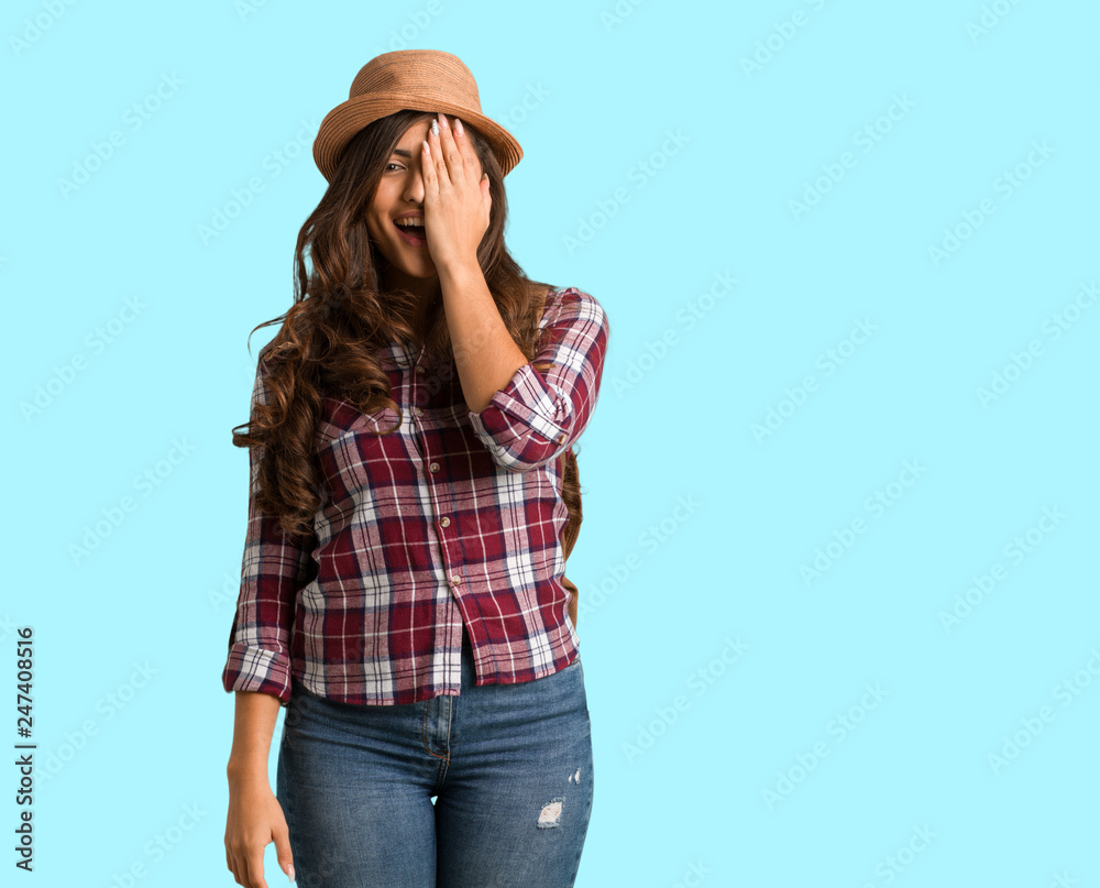 Full body young traveler curvy woman shouting happy and covering face with hand