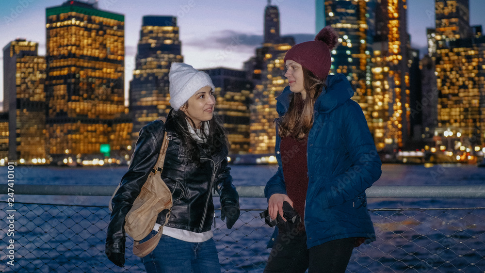 The wonderful Manhattan skyline visited by two girls in New York The wonderful Manhattan skyline visited by two girls in New York