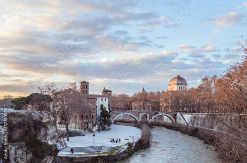 a view of the Tiber River at sunset in Rome