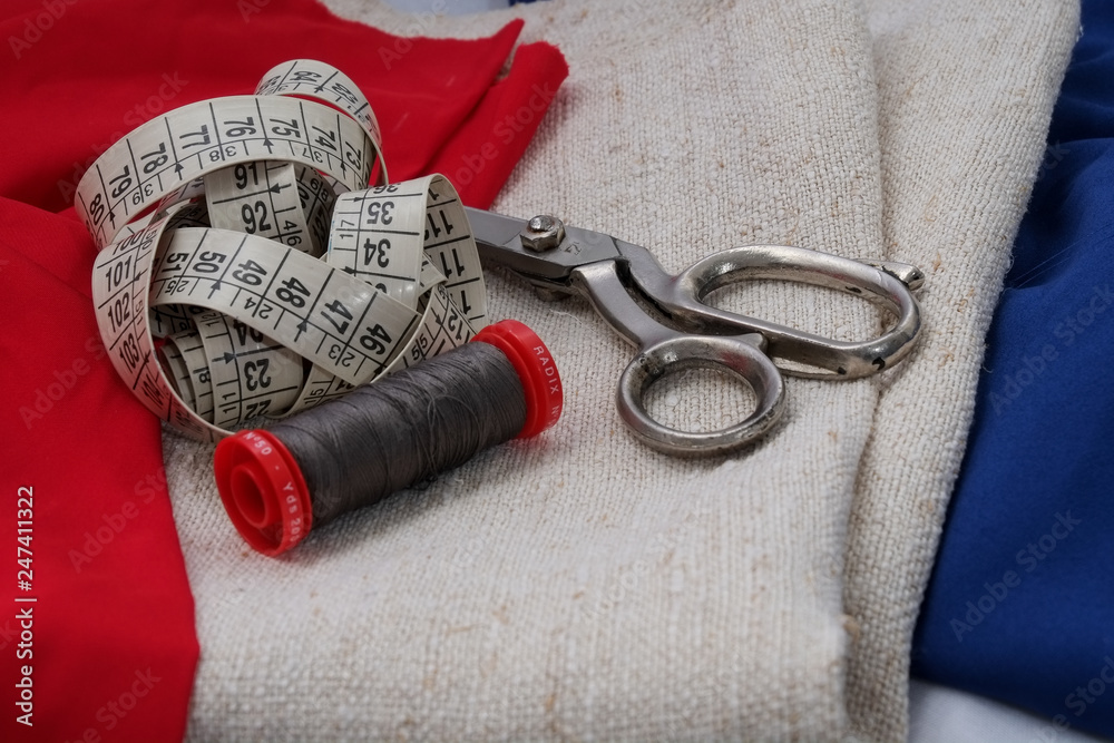 Naklejka premium sewing accessories on a white background