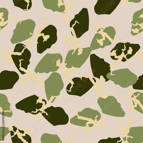 Forest camouflage of various shades of green, beige and yellow colors