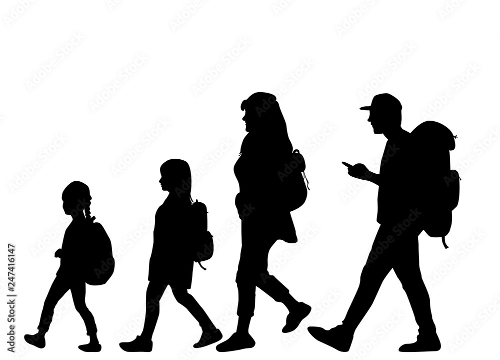 Silhouette family on a walk.