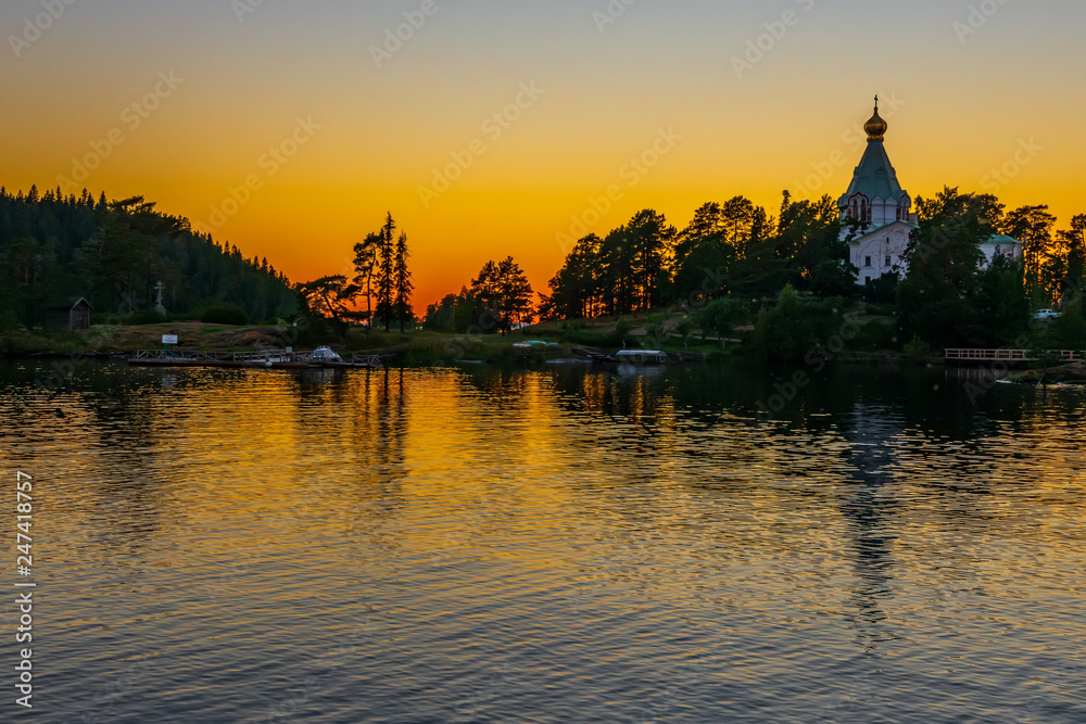 Sunset over the island of Valaam, Nikolsky skit_1. The wonderful island Valaam is located on Lake Lodozhskoye, Karelia. Balaam - a step to heaven