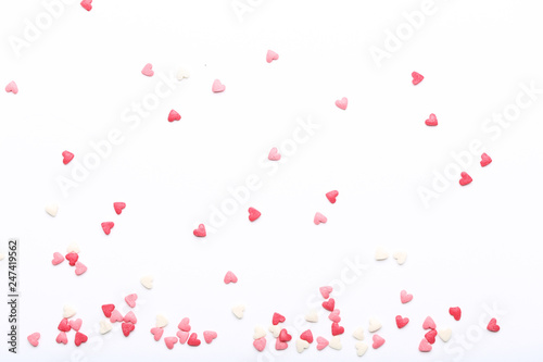 Heart shaped sprinkles on white background