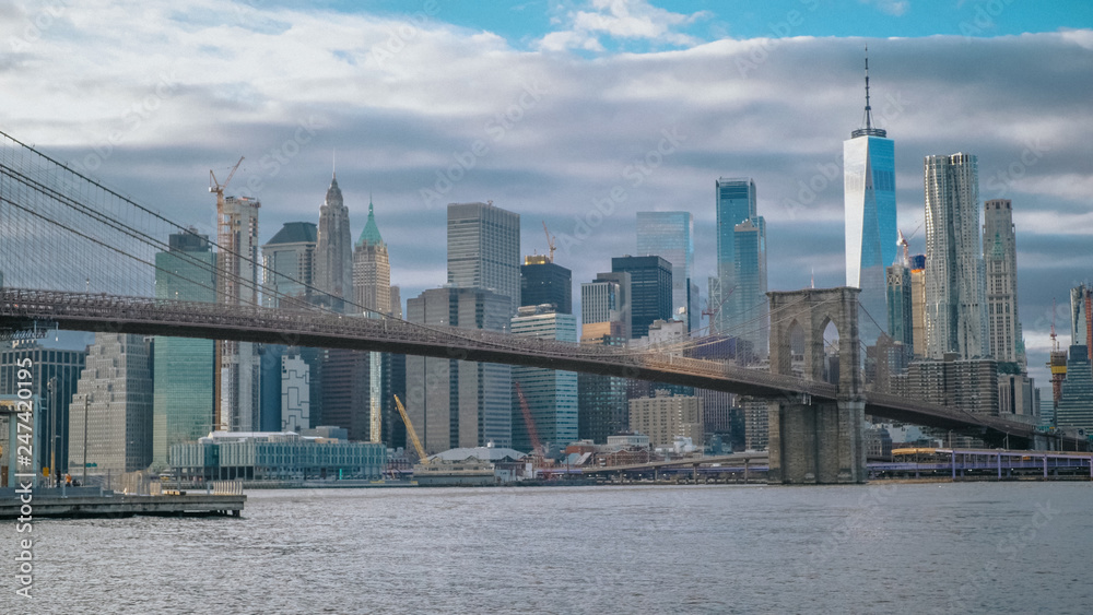 Amazing view over the skyline of Manhattan with Brooklyn Bridge