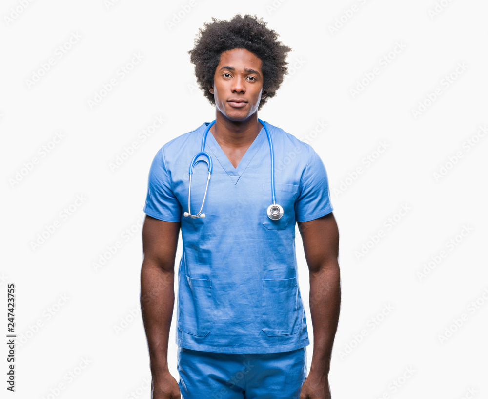Afro american surgeon doctor man over isolated background with serious expression on face. Simple and natural looking at the camera. Afro american surgeon doctor man over isolated background with serious expression on face. Simple and natural looking at the camera.