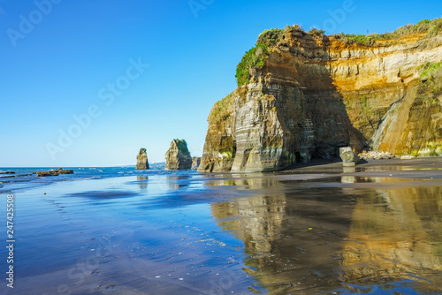 on the beach, 3 sisters and elephant rock, new zealand 18