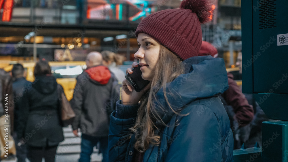 Young woman at a street corner in Manhattan New York