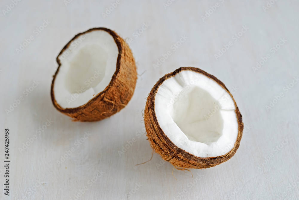 Ripe coconuts on grey background Ripe coconuts on grey background