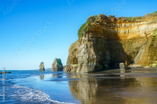 on the beach, 3 sisters and elephant rock, new zealand 26