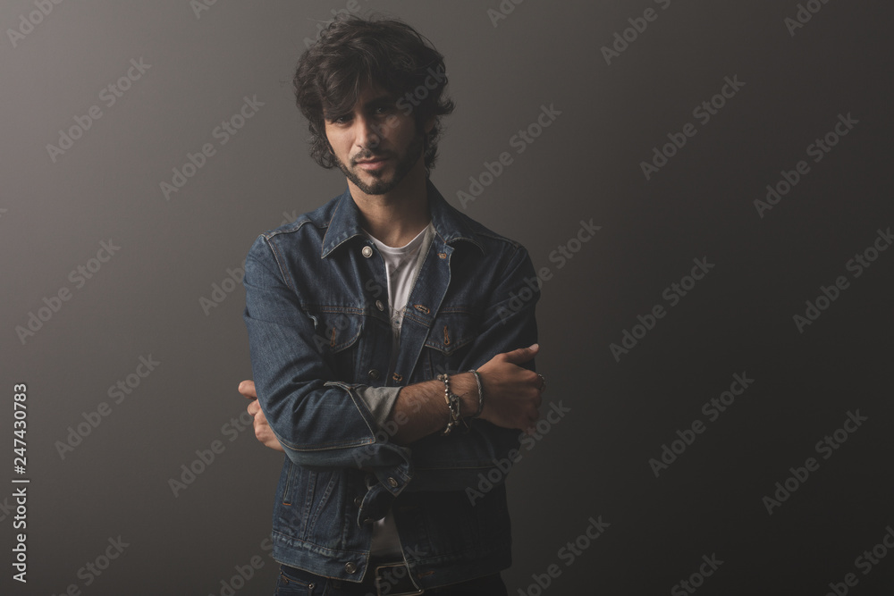 Fototapeta premium Young caucasian rock an roll man expressing emotions