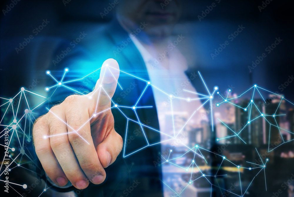 Business man point finger to global futuristic technology network Business man point finger to global futuristic technology network