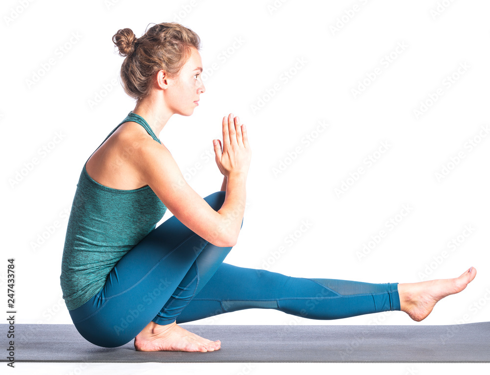Obraz premium Athletic young blonde woman doing yoga practice isolated on white background. Concept of sport - healthy life and natural balance between body and spiritual development