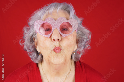 Comical granny with heart shape glasses
