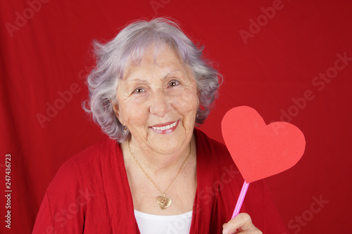 Grandma with heart shaped sign