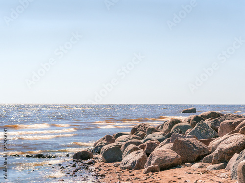 Granite stones on the shore of the bay