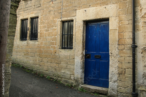 A picture of a traditional facade of a British house in Bradford on Avon.  © shootingtheworld