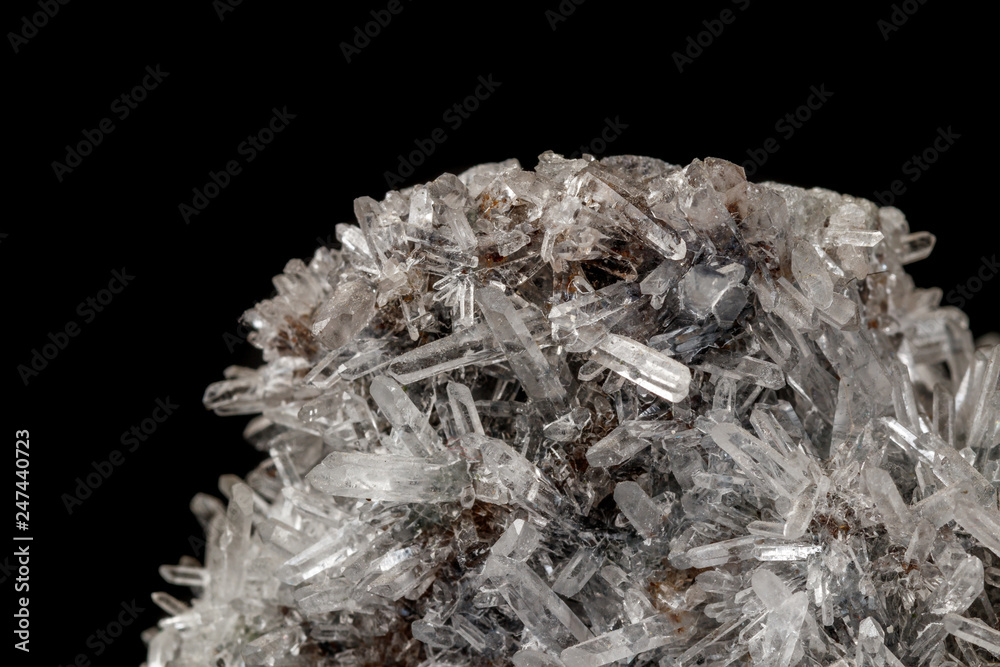 Macro mineral stone sulfite quartz on a black background