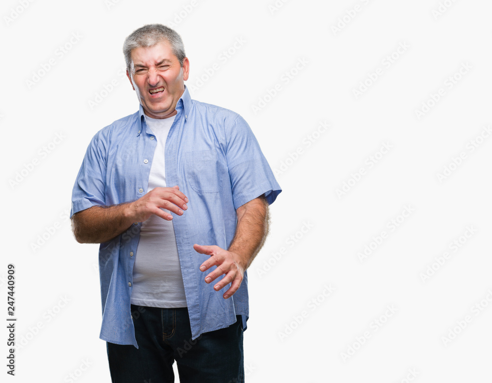 Handsome senior man over isolated background disgusted expression, displeased and fearful doing disgust face because aversion reaction. With hands raised. Annoying concept. Handsome senior man over isolated background disgusted expression, displeased and fearful doing disgust face because aversion reaction. With hands raised. Annoying concept.