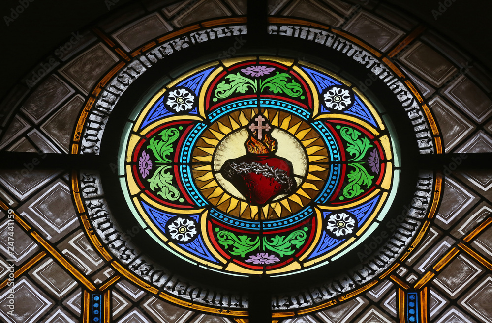 Sacred Heart of Jesus, stained glass window in the parish church of St. Peter and Paul in Oberstaufen, Germany 