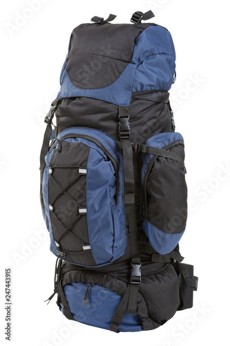 a large black backpack with blue accents, filled with things, stands on a white background