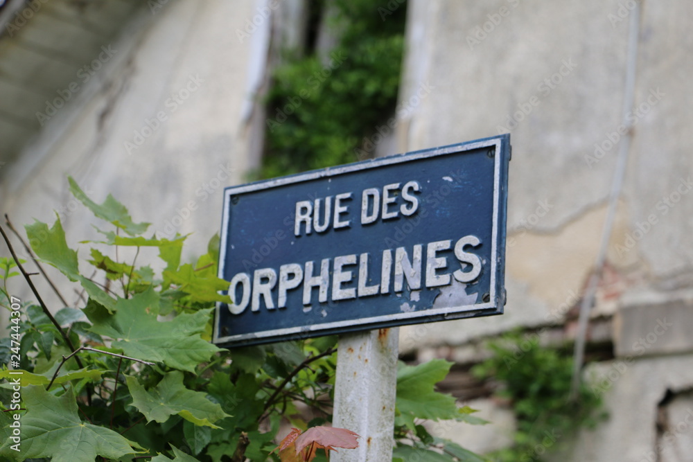 Metal, rustic board - street name sign. Provins, France, Champagne, UNESCO, France, Seine-et-Marne, Ile-de-France Metal, rustic board - street name sign. Provins, France, Champagne, UNESCO, France, Seine-et-Marne, Ile-de-France