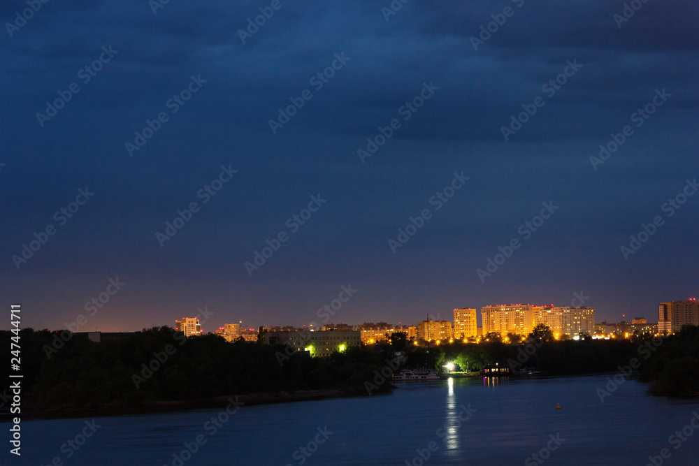 View is of the embankment, sity is Omsk, Russia