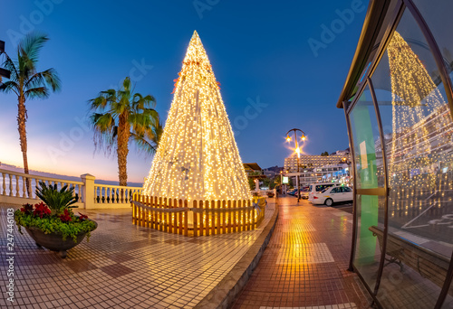 Christmas scene outdoors in Puerto de Santiago town in winter season holiday in Tenerife photo