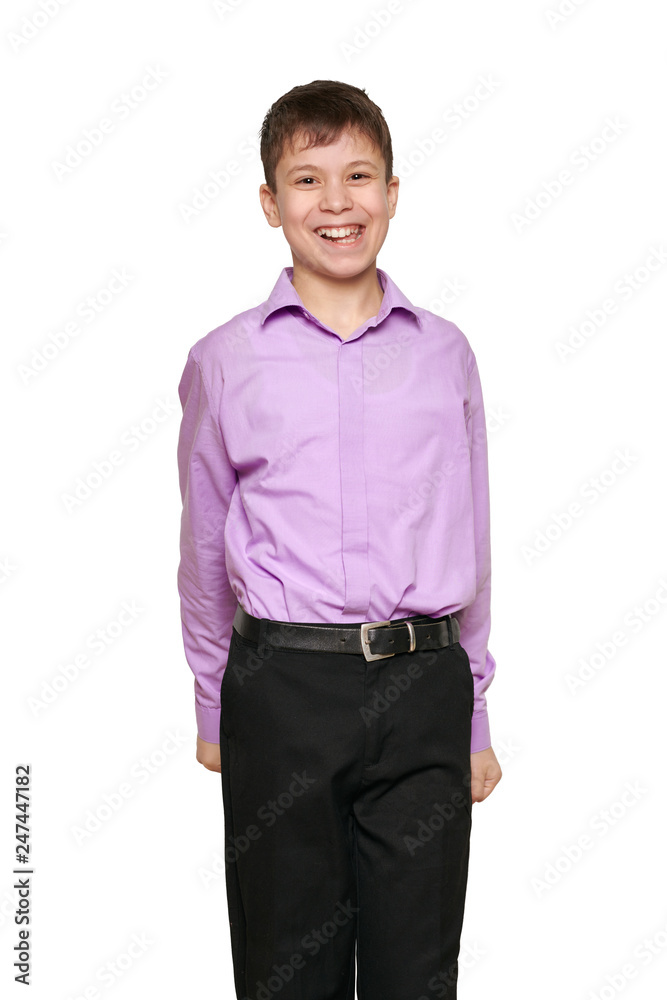 Boy posing on white background, black trousers and purple shirt Boy posing on white background, black trousers and purple shirt