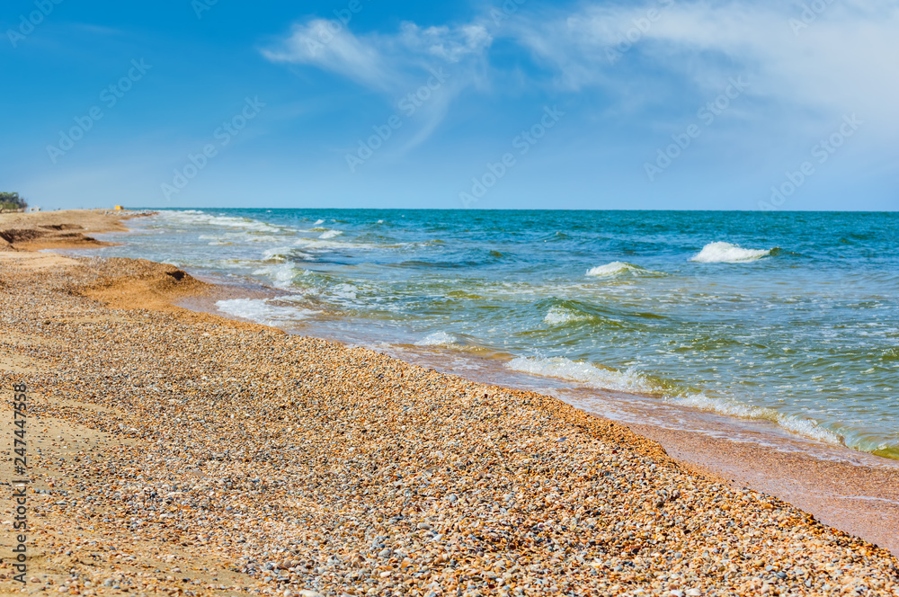 Deserted beach on a sunny summer day