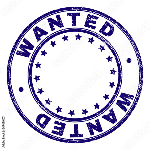 WANTED stamp seal watermark with grunge texture. Designed with circles and stars. Blue vector rubber print of WANTED label with scratched texture.