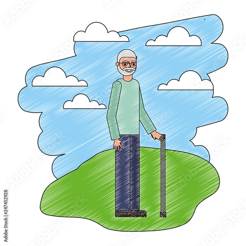 grandpa standing with cane in the landscape