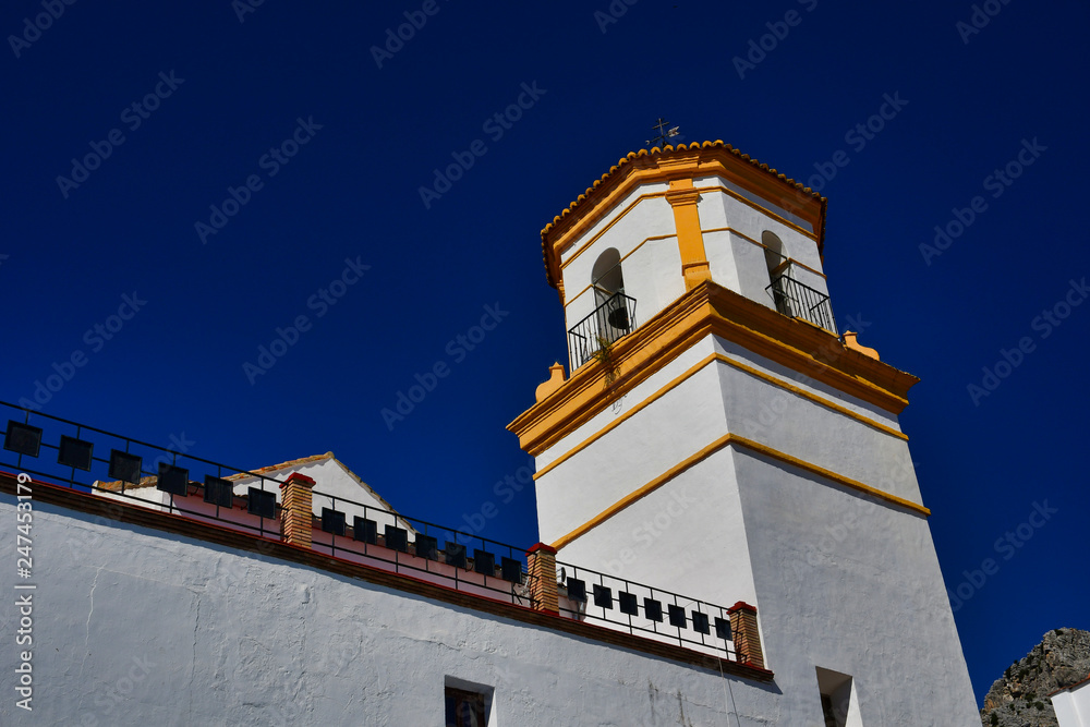 Spanish church tower with blue sky