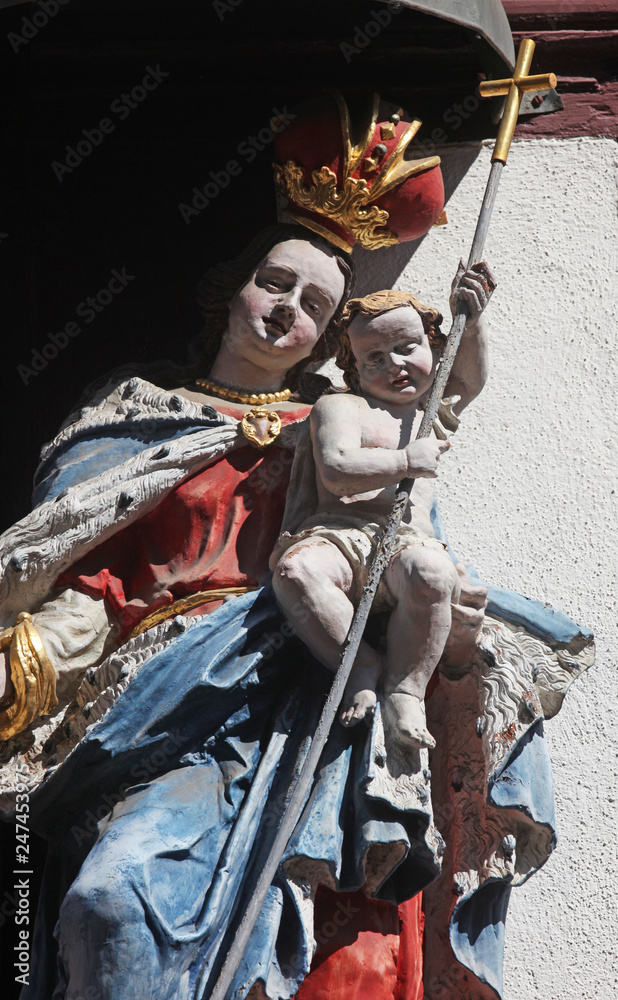 Fototapeta premium Madonna with child Jesus, Statue on the main street of Miltenberg in Lower Franconia, Bavaria, Germany