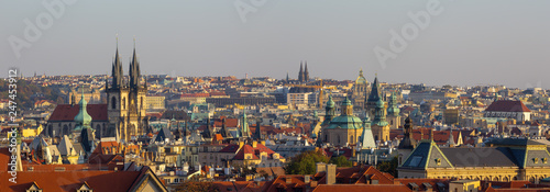 Prague - The panorama of Town and the church of Our Lady before Týn in the evening light.