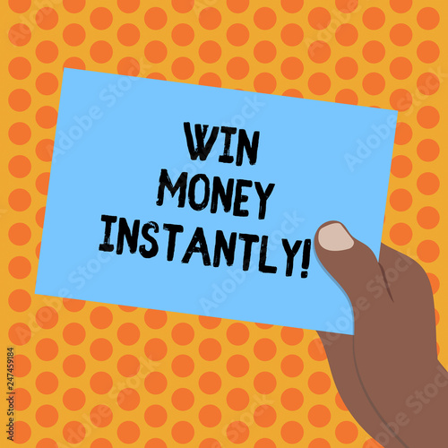 Writing note showing Win Money Instantly. Business photo showcasing getting cash as prize in competition sport or game Drawn Hu analysis Hand Holding Blank Color Paper Cardboard photo