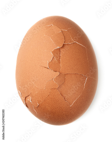Single cracked brown chicken egg