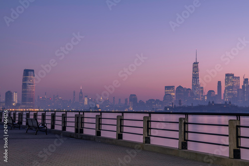 Silent morning at Liberty State Park, featuring New York and New Jersey skyline on the background and waterfront park on the foreground