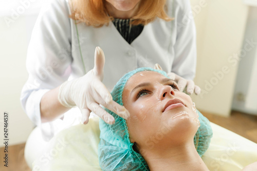 The cosmetologist makes the procedure ultrasonic face