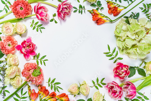 Froral pattern on white table background top view mockup
