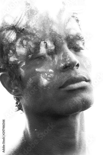 Paintography. Double exposure of an attractive male model combined with hand drawn ink paintings with depth and texture, black and white © LUMEZIA.com