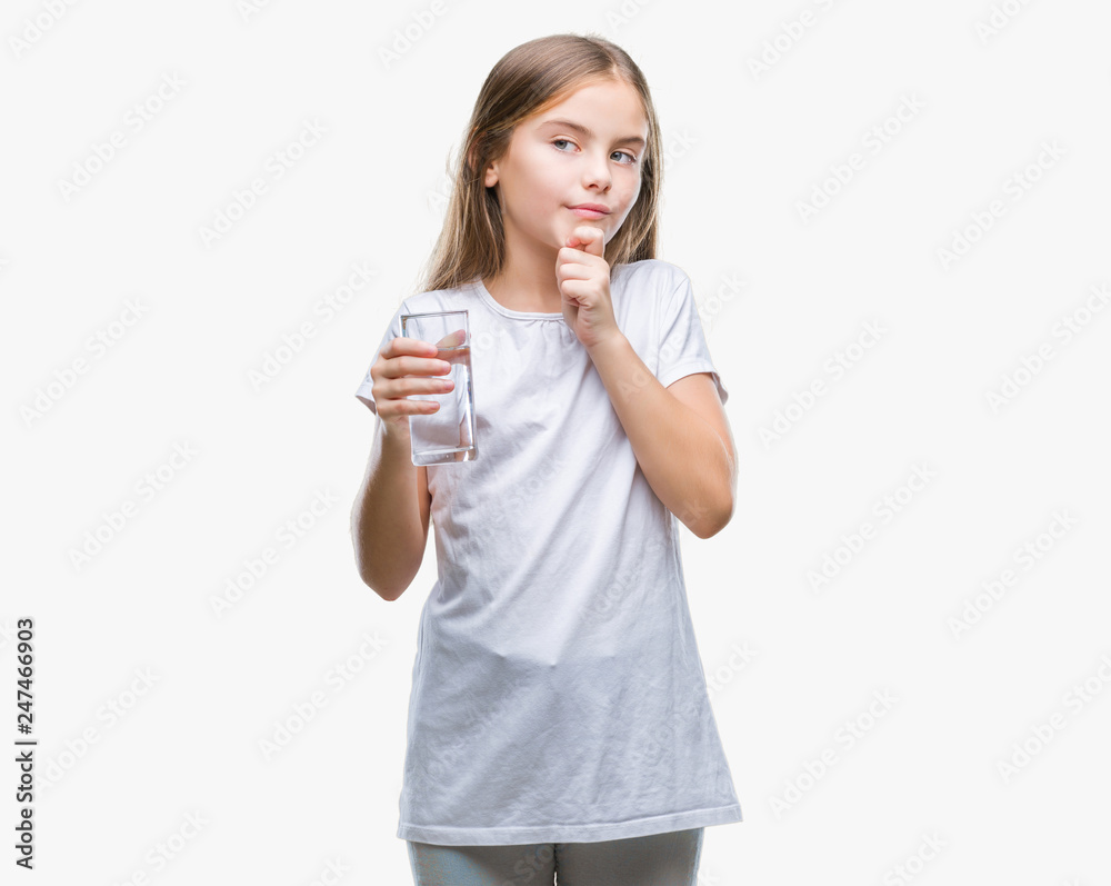 Young beautiful girl drinking glass of water over isolated background serious face thinking about question, very confused idea Young beautiful girl drinking glass of water over isolated background serious face thinking about question, very confused idea