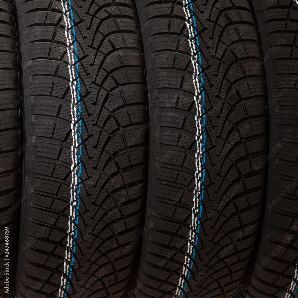 New winter tires isolated over white
