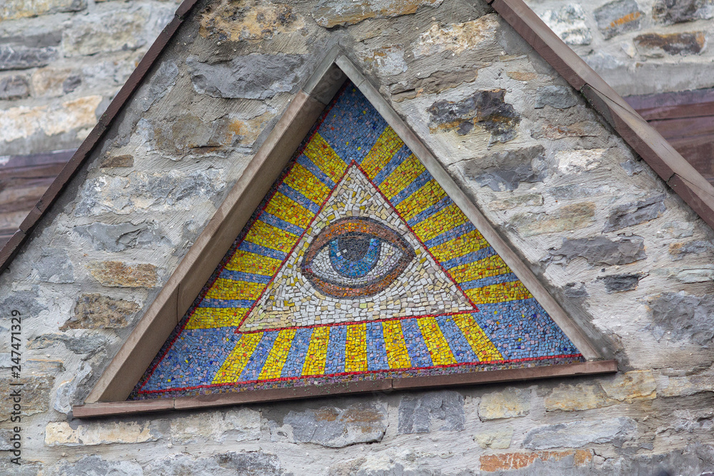 All-seeing eye of God - a mosaic of wall background medieval church ...
