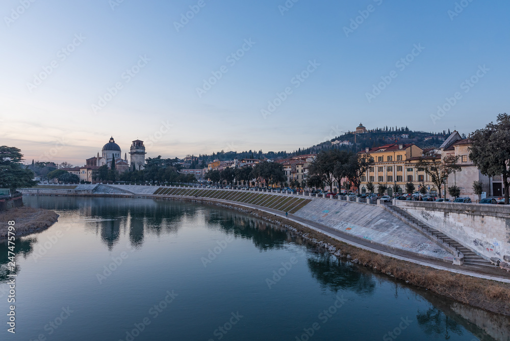 Evening view of the Adige river from the Pietra bridge in Verona