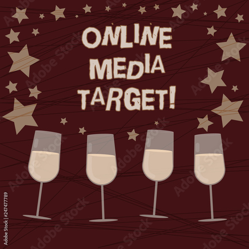 Conceptual hand writing showing Online Media Target. Business photo showcasing intended audience or readership of publication Filled Cocktail Wine with Scattered Stars Confetti Stemware